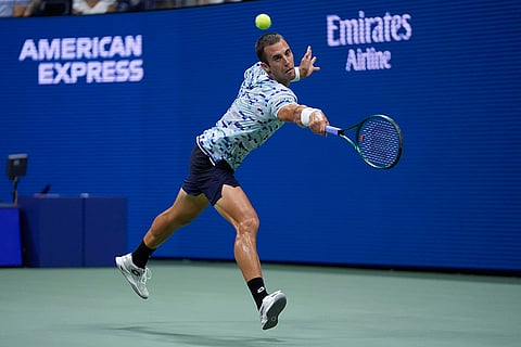 US Open 2024: Laslo Djere, of Serbia, returns a shot to Novak Djokovic